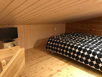 Фото номера Двухместный номер с 1 кроватью Дома для отпуска Riverside Cottage Aalto Borealis г. Кеминмаа 42